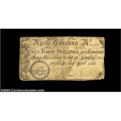 North Carolina April 4, 1748 40s Very Fine, damaged. Backed, as is almost always the case, and with