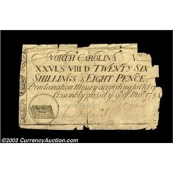 North Carolina March 9, 1754 26s8d Very Fine, damaged. All of the text is present, although the righ
