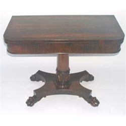 A Regency rosewood card table with D-shaped folding top inset green baize interior, raised on aca...