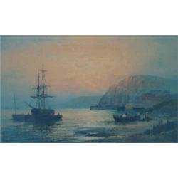 Hubert Thornley Oil on canvas Coastal scene with beached fishing boats and figures signed 9.5ins....