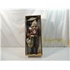 Image 1 : PORCELAIN DOLL BOY WITH MUSICAL BAG