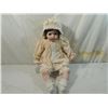 Image 1 : SITTING PORCELAIN DOLL