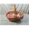 Image 1 : VINTAGE 80s BABY DOLL IN BASKET
