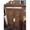 Image 1 : ANTIQUE CARVED CUPBOARD WITH BEVELLED CORNERS AND TILED HEADER