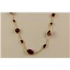 Image 2 : ONE 14KT YELLOW GOLD STATION STYLE RUBY NECKLACE BEZEL SET WITH 10 OVAL MIXED CUT NATURAL RUBIES