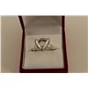 Image 1 : ONE LADIES 14KT WHITE GOLD DIAMOND SET ENGAGEMENT RING. MADE IN A TRIANGULAR SHAPED HALO CLUSTER,