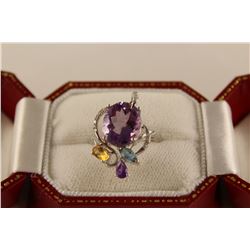 ONE 18KT WHITE GOLD NATURAL AMETHYST, CITRINE QUARTZ, BLUE TOPAZ AND DIAMOND SET LADIES DRESS RING.