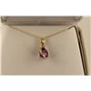 Image 1 : ONE 14KT YELLOW GOLD NATURAL PURPLE SAPPHIRE AND DIAMOND SET PENDANT. SET WITH ONE OVAL MIXED CUT