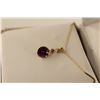 Image 2 : ONE 14KT YELLOW GOLD NATURAL PURPLE SAPPHIRE AND DIAMOND SET PENDANT. SET WITH ONE OVAL MIXED CUT