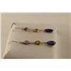 Image 2 : PAIR OF 14KT WHITE GOLD PURPLE, YELLOW & BLUE SAPPHIRE DANGLING EARRINGS. SET WITH 2 FREE FORM OVAL