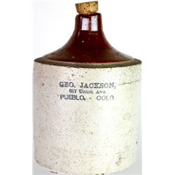 Advertising stoneware whiskey jug stamped