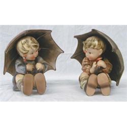 HUMMEL PORCELAIN "UMBRELLA BOY" AND "UMBRELLA GIRL", German. Model No. 152/A and 152B/. Stylize...