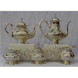 FIVE PIECE STERLING SILVER TEA AND COFFEE SERVICE, American. 1896-1940. Maker: Frank M. Whiting...