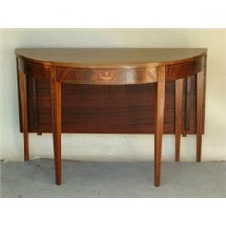 CHIPPENDALE INLAID MAHOGANY DINING TABLE, American. 18th Century. In two parts. Each D-shaped t...