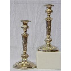 ASSEMBLED PAIR OF GEORGE IV STERLING SILVER CANDLESTICKS, English. Sheffield. 1822 and 1824. Ma...