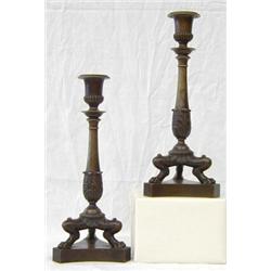 FINE PAIR OF EMPIRE PATINATED BRONZE CANDLESTICKS, French. Late 18th Century. Each circular tap...
