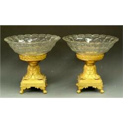 VERY FINE PAIR OF EMPIRE ORMOLU AND BACCARAT GLASS TAZZAS, French. Circa 1800. Each paneled bow...