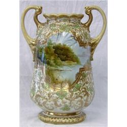 FINE NIPPON PORCELAIN VASE, Japanese. 1891-1921. Green maple leaf mark. Painted with two river...