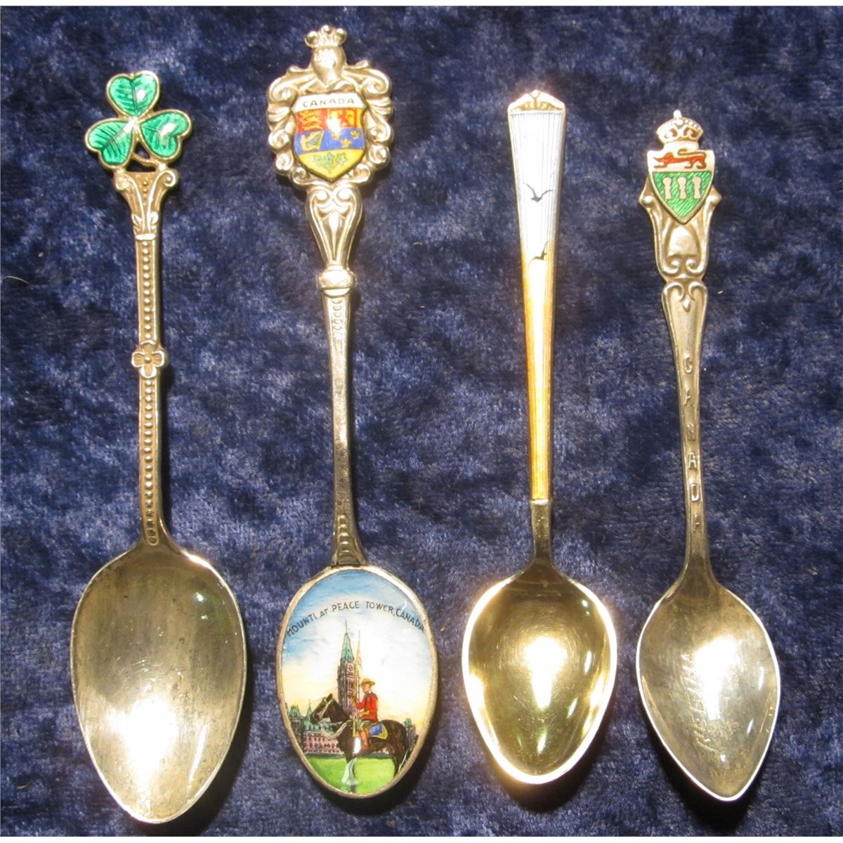 923. 4 enameled silver spoons, 2 are quite ornate!
