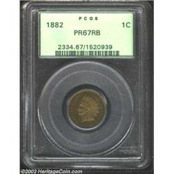 1882 1C PR67 Red and Brown PCGS. A needle-sharp Superb Gem that has iridescent olive-green and honey