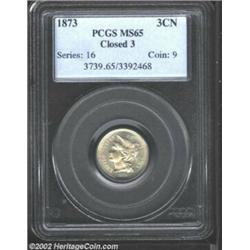 1873 3CN Closed 3 MS65 PCGS. The lightest golden iridescence is seen on both sides of this sharply s