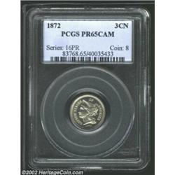 1872 3CN PR65 Cameo PCGS. The obverse is brilliant, while the reverse has blushes of apricot and ste