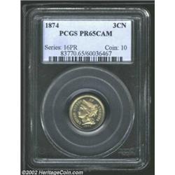 1874 3CN PR65 Cameo PCGS. Dusky tan patina cannot hide the exquisite cameo contrast. A boldly struck