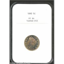 1892 5C PR64 NGC. A boldly struck near-Gem with mottled lemon-gold color and splendidly reflective f