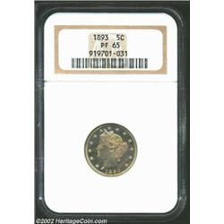 1893 5C PR65 NGC. Splendid variegated gold, apricot, rose, and steel-blue patina. A razor-sharp Gem.