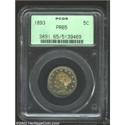 1893 5C PR65 PCGS. The obverse is dusted with gold color, while the reverse is generally untoned. Bo
