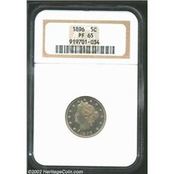 1896 5C PR65 NGC. The mirrors are somewhat subdued due to smoky green toning that floats over both s