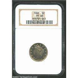 1902 5C PR65 NGC. Nicely mirrored beneath splashes of pastel toning. From the Williams Collection. I