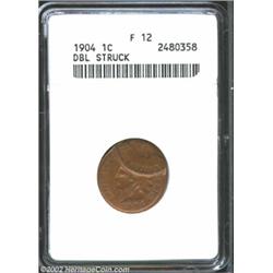 1904 1C Cent Fine 12 ANACS. The second strike is at 1 o'clock relative to the first strike. The seco