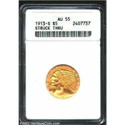 1913-S $5 Half Eagle--Struck Through--ANACS. All errors are rare on U.S. gold coins, but to find one