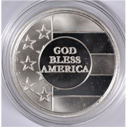 "GOD BLESS AMERICA" ON A ONE OUNCE .999 SILVER ROUND IN PLASTIC CAPSULE