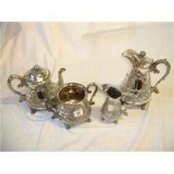 4 PIECE EP TEA SERVICE COMPRISING: SUGAR AND CREAM, TEAPOT AND HOT WATER POT...