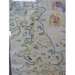 A WWI MAP SAMPLER, showing England, Scotland, Wales and Northern Ireland in colours, framed 62cm ...