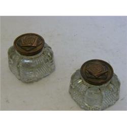 A PAIR OF PRESSED GLASS INK CONTAINERS, c.1900, Celtic design Arts and Crafts covers, (2)  £20-30...