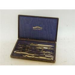 A CASED EDWARDIAN DRAUGHTSMAN'S SET, labelled 'A. West & Partners'  £30-40...