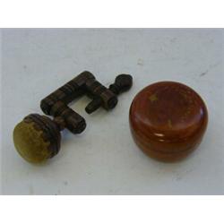 A ROSEWOOD NEEDLEWORK CLAMP, 19th Century, turned with velvet pin cushion, height 12cm and a circ...