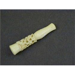 AN IVORY CIGAR TUBE, c.1900, pierced and carved, length 9cm  £20-30...