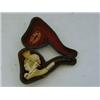 Image 1 : A CASED MEERSCHAUM CIGARETTE TUBE, carved with the head of a grisette, length 10cm  £20-30...