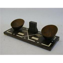 A MACASSAR SMOKERS COMPANION, inlaid bone tablets, 'Lome', 'Togo' and Union Jacks, matchbox holde...