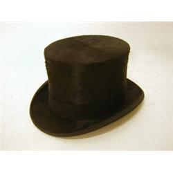A CASED DUNN & CO BLACK TOP HAT, kid and silk lined  £30-40...