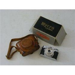 A BOXED JAPANESE 'MYCRO CAMERA', with leather outer case, length 5cm  £20-40...