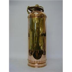 A COPPER AND BRASS FIRE EXTINGUISHER, maker Read & Campbell, height 60cm  £30-40...