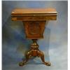 Image 1 : A Victorian inlaid figured walnutwood work table fitted  a deep basket and raised on pillar and t...