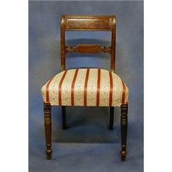 A set of 4 Georgian bar back dining chairs with shaped mid-rails and upholstered seats, on turned...