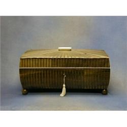 A Regency cow horn and ivory twin compartment tea caddy, the interior fitted a glass mixing bowl...