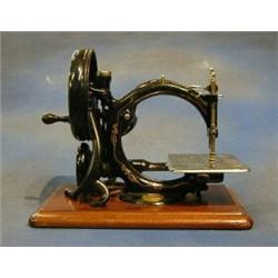 A Willcock & Gibbs portable manual sewing machine complete with instructions and carrying case £5...